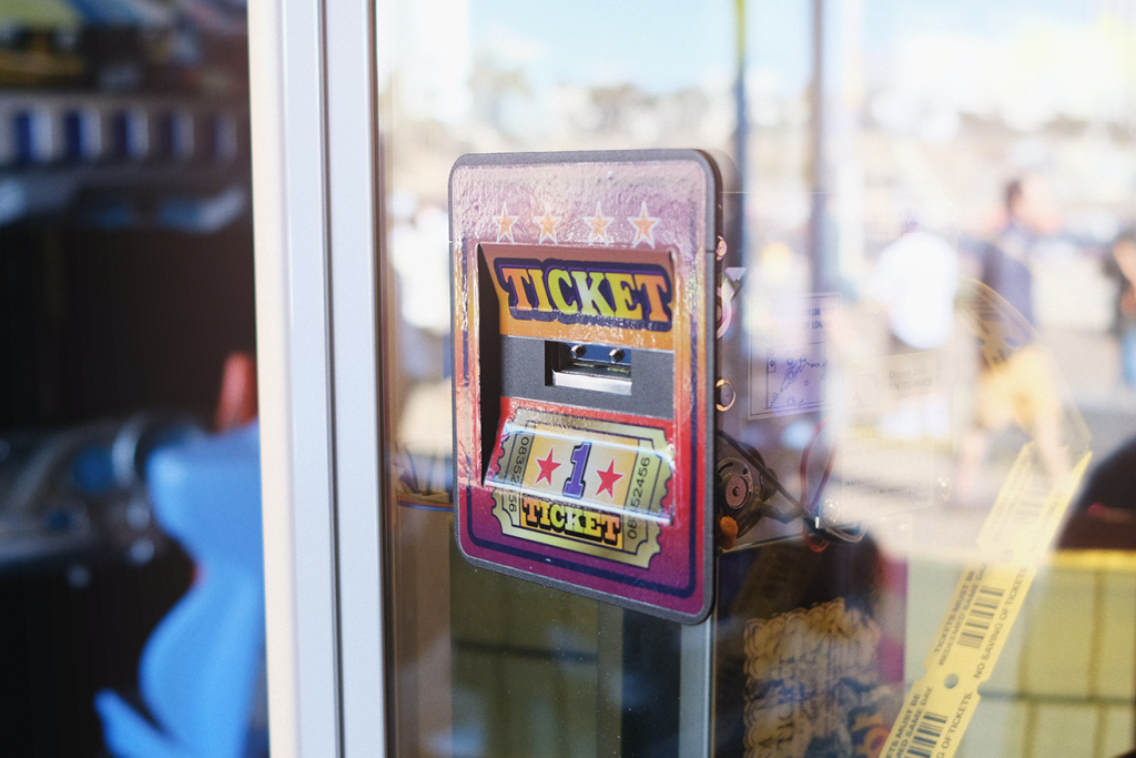 Image showing a advertisement attached to a window indicating that tickets are on sale